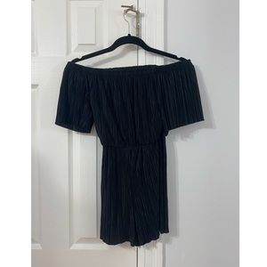 Off the shoulder black romper with a back cutout